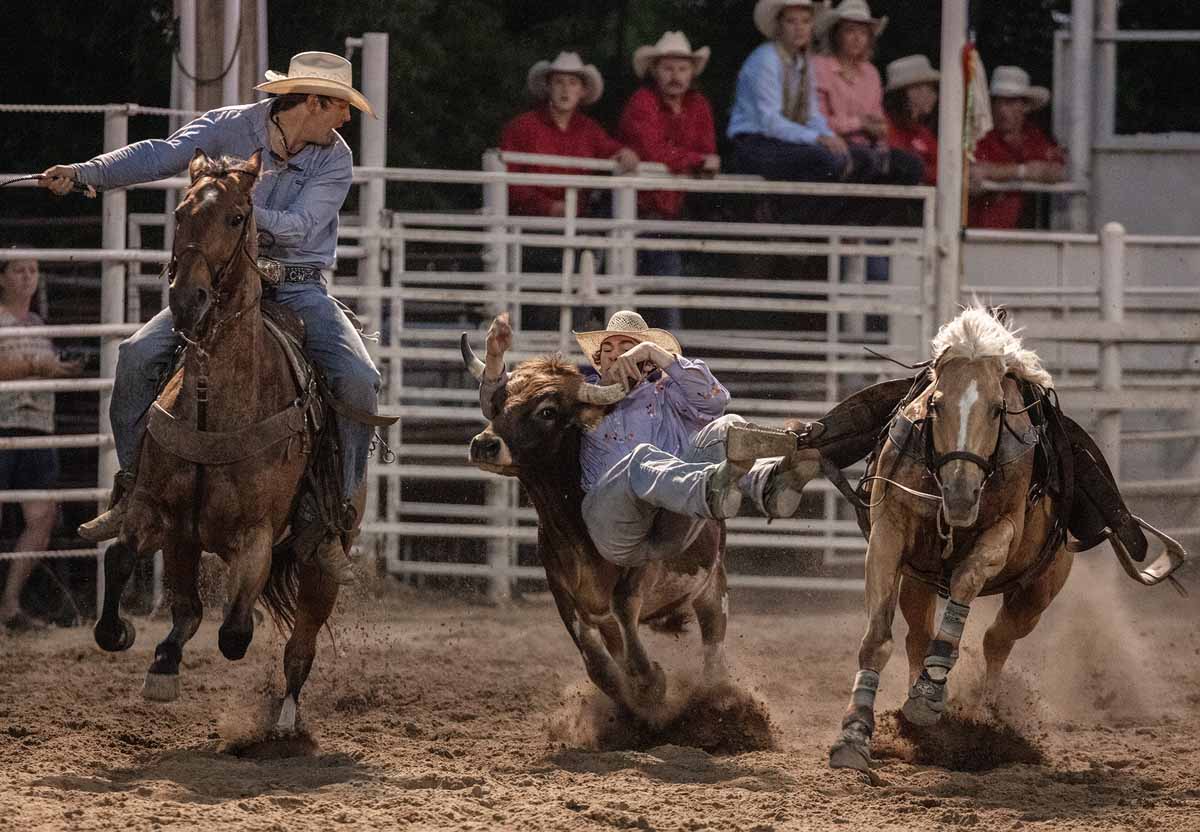 Steer wrestling TravelWorld International Magazine